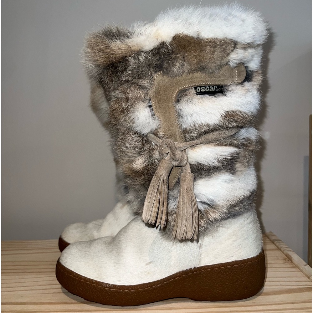 Oscar sports white winter fur boots